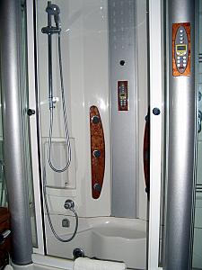 Our fancy shower, in our bathroom. The shower had a rainfall function, back massager jets, a steam sauna and a whirlpool tub. Oh yeah, it also had a phone built in so you could call other rooms!