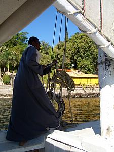 Sailing back up the Nile on our felucca. We were now traveling against the Nile's current. It was fascinating to watch how the captain had to navigate the felucca almost perpendicular to the flow of the water to take advantage of the winds and travel against the current.