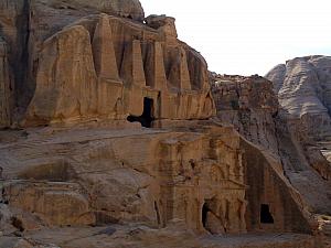 Petra features many burial temples of the Nabataeans around the turn of the millenium. They carved elaborate facades into the mountain-side and small niches into the mountain for their burial tombs.