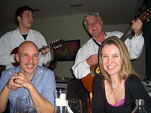 Our friends Mick and Paula, serenaded by Dalmatian musicians during our dinner at Art Cafe. 