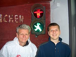 Dad and Kevin Klocke posing in front of the stop light.