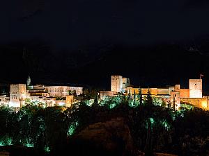 Alhambra by night, seen from Granada - photo credit to Flickr user Sdr Milano