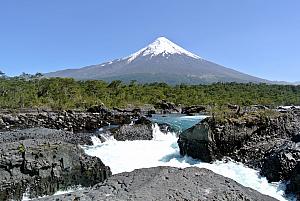 Puerto Montt, Chile - Osorno Volcano in front of a waterfall