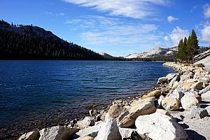 Driving to Tuolumne Meadows, passing a scenic lake.