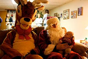 We were lucky enough to receive a visit from Santa and Rudolph! They've been coming to Nana and Papa's house for more than 25 years -- unfortunately Rudolph has upgraded from his aluminum-foil antler suit.