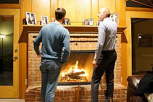 Jay and Mike enjoying the warmth of the fireplace