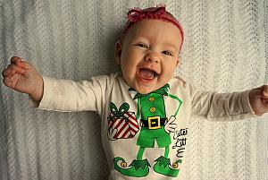 She's the cutest little elf, at least the shirt says so.