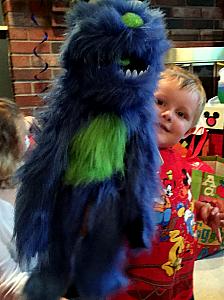 Coopers third birthday -- playing with his furry monster!
