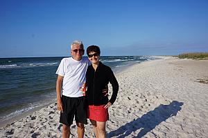 Grammy and Grandpa posing on the beach.