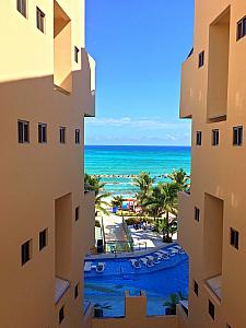 Looking out at the water between two condo buildings. Capri was excited every time we'd walk by these openings!