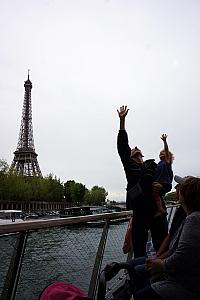 On a boat tour of the Seine River -- Jay and Capri reaching for the sky (well, really, a bridge that we were passing under, you just can't see that)