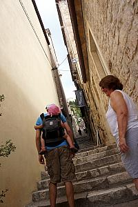 Trekking up the steps -- Capri has the best seat ;)