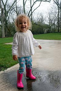 Capri wanted to go play in the rain in her rain boots 
