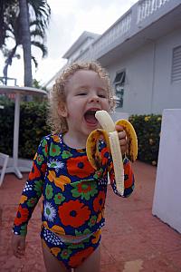 Capri enjoying her banana!