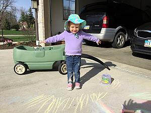 Showing off her chalk artwork!