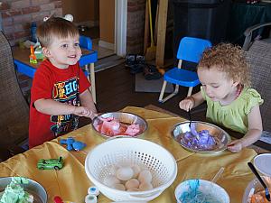 Capri and Cooper dyeing some eggs
