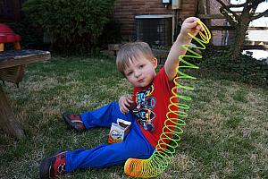 Benny playing with his slinky
