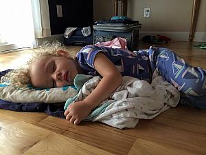 This is what happens when Dad puts Capri down for a nap - she gets cranky and ends up sleeping on the floor instead (=