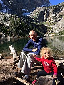 Capri and Dad taking a break on the hike.