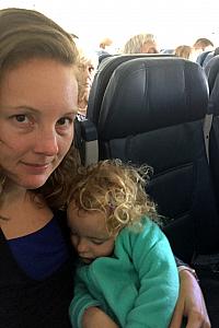 Capri napped with her mama on the plane ride home.